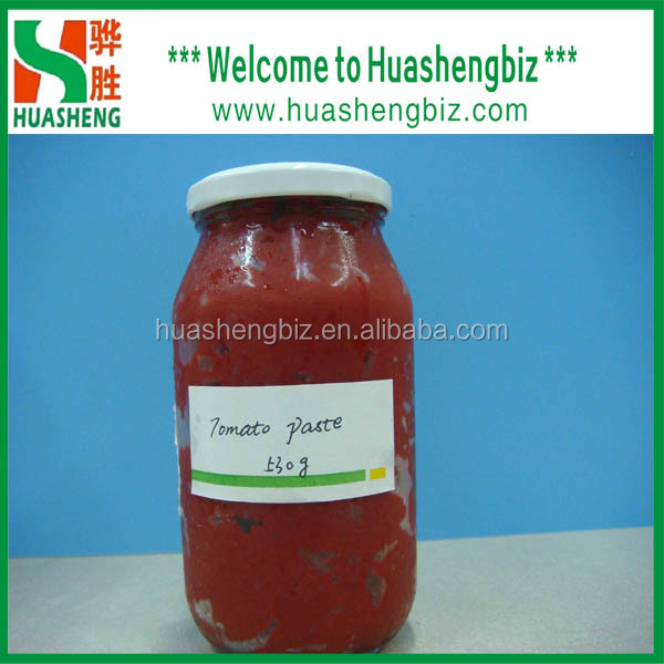 Fresh tomato paste in glass jar