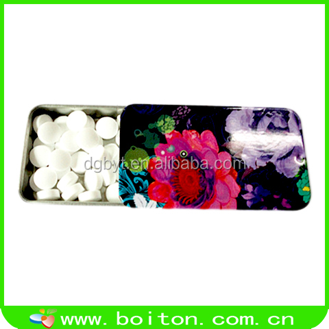 Extra strong mints candy in slide tin