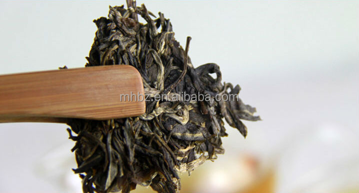 Dry compressed puerh uncooked tea
