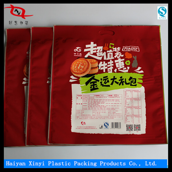 Specialized in color printing laminating new design packaging plastic bags with header from china manufacturer