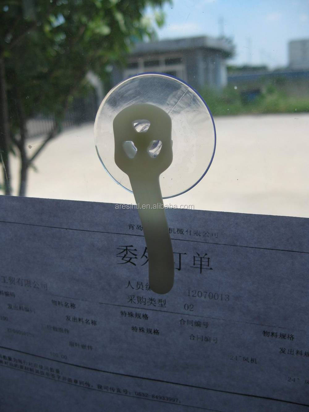 parking permit holder with removable sucker