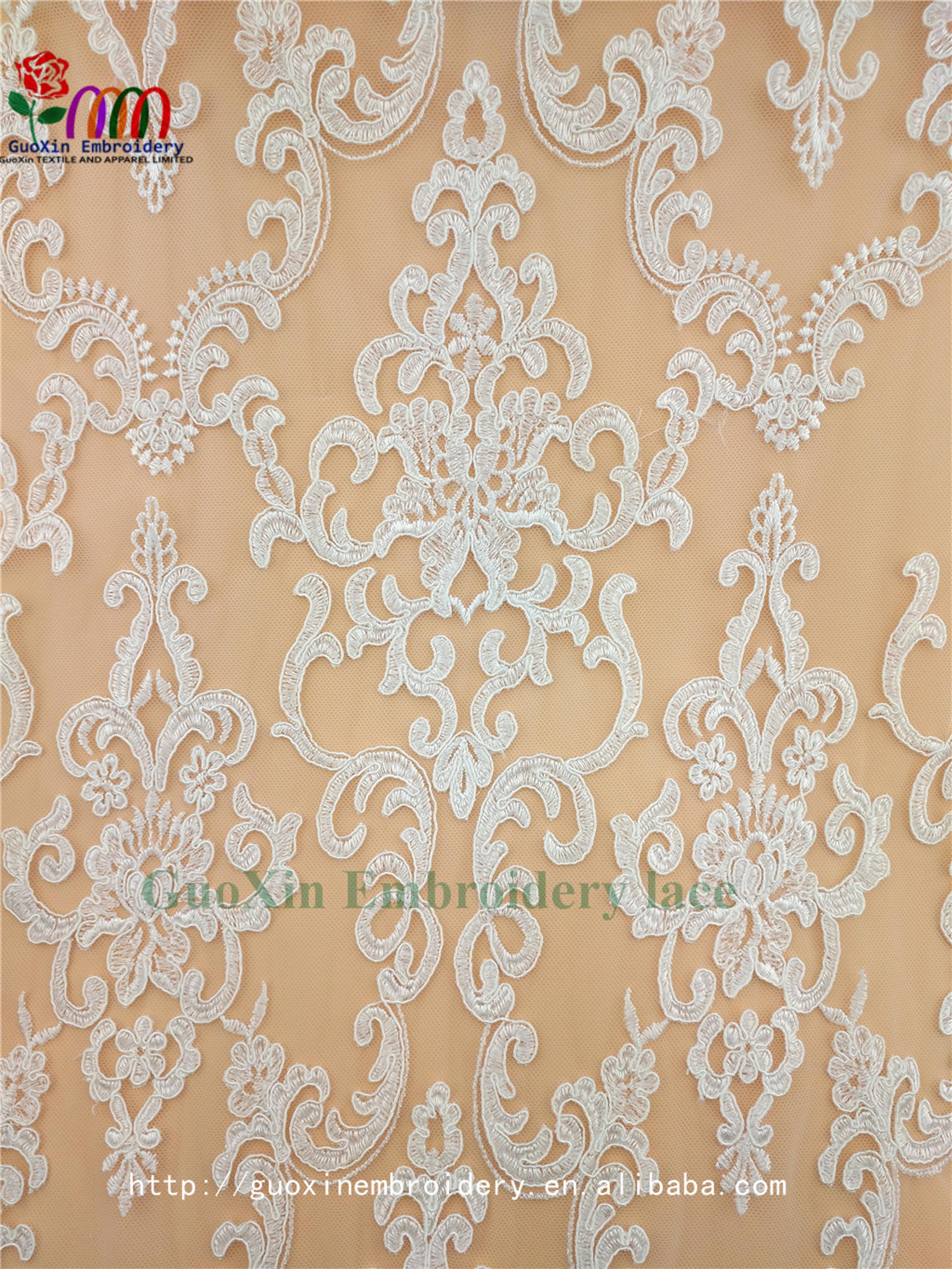 embroidery tulle manufacture wholesale wedding veil ivory lace fabric with cording (1).jpg