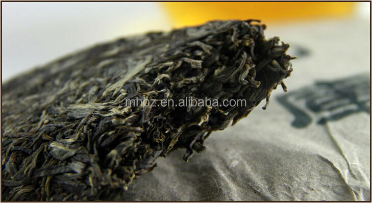 Dry compressed puerh uncooked tea