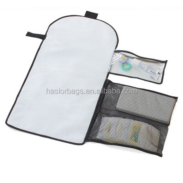 Foldable nappy bag pouch with changing mat