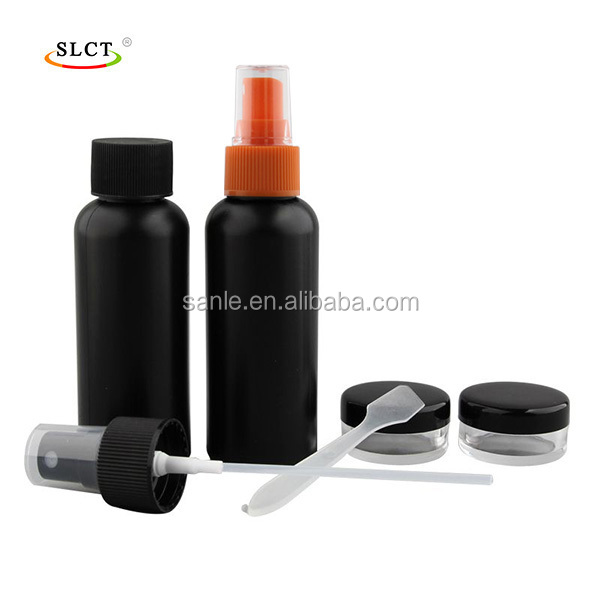 Empty cosmetic bottles and jars in black