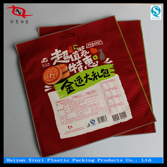 Specialized in color printing laminating new design packaging plastic bags with header from china manufacturer