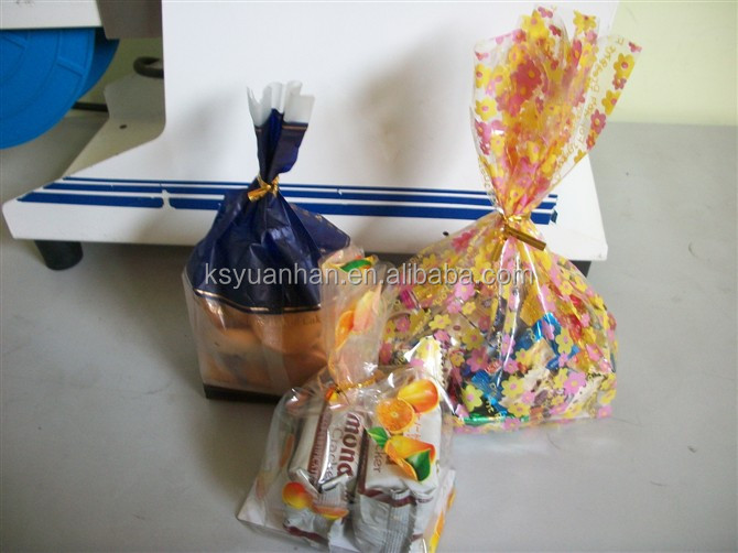 Chocolate bar on a stick wrapping machine