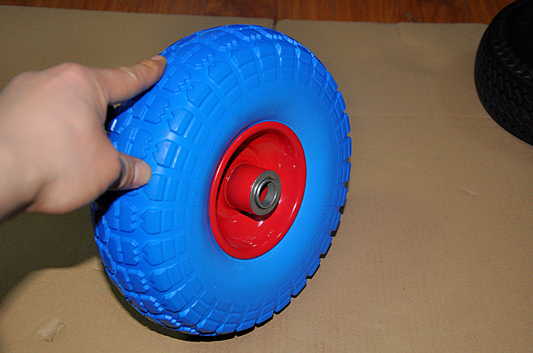 750-2 10x3.00-4 PU filled wheel.jpg