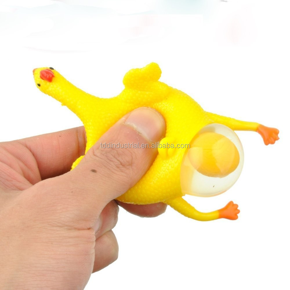 cheap creative trick-playing toy yellow rubber chicken lays eggs